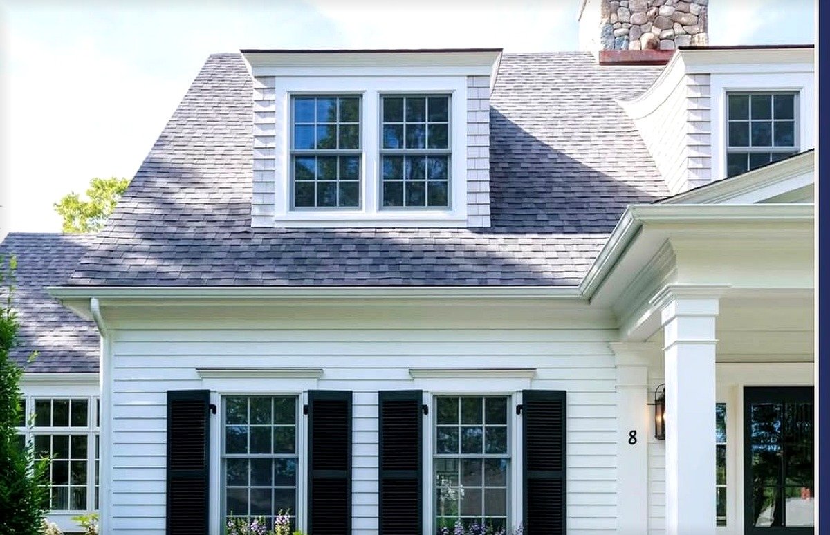Exterior house painting on a Cape Cod home by Fabricio Painting