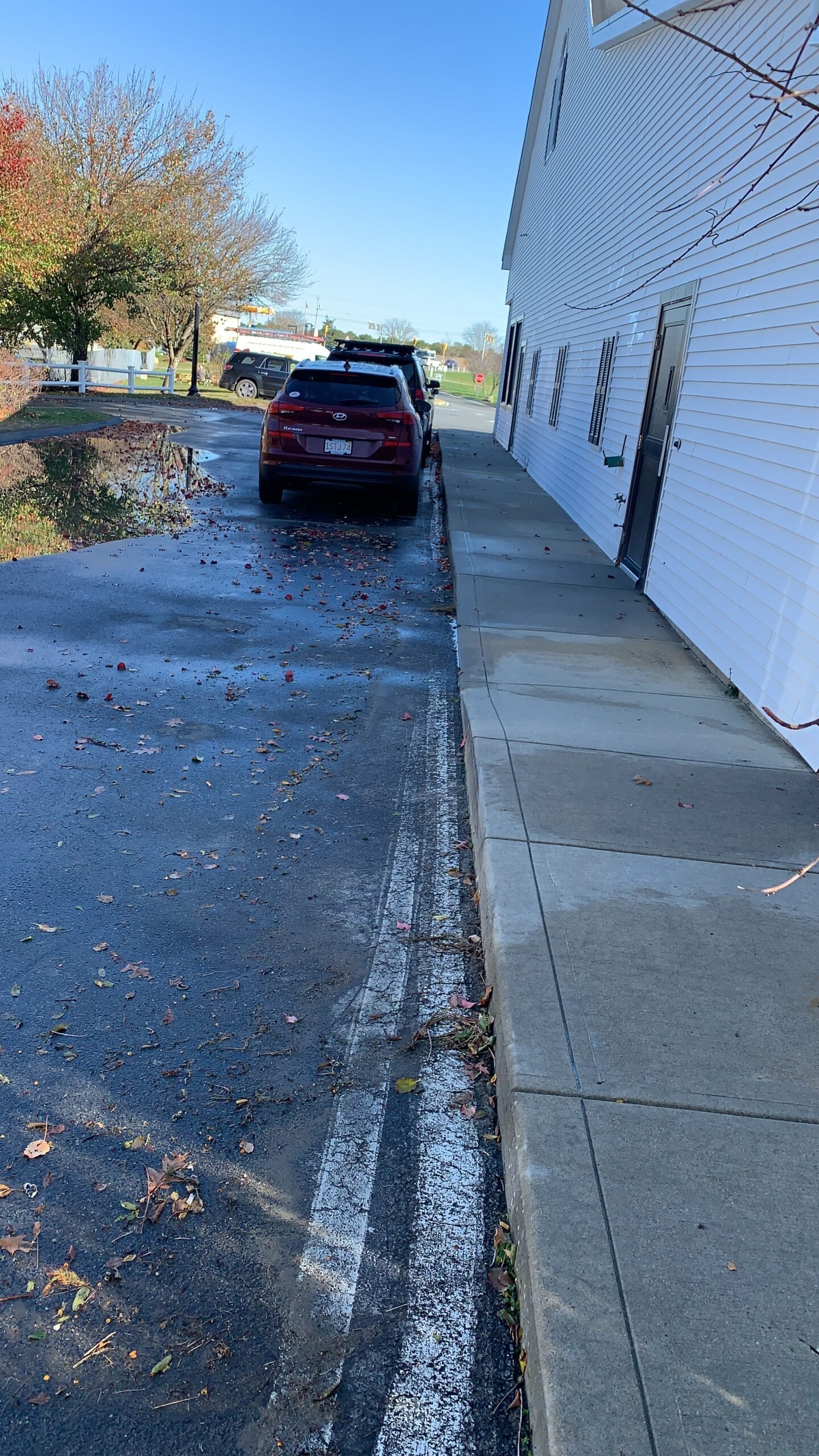 Concrete driveway cleaning by Fabricio Painting in South Dennis, MA